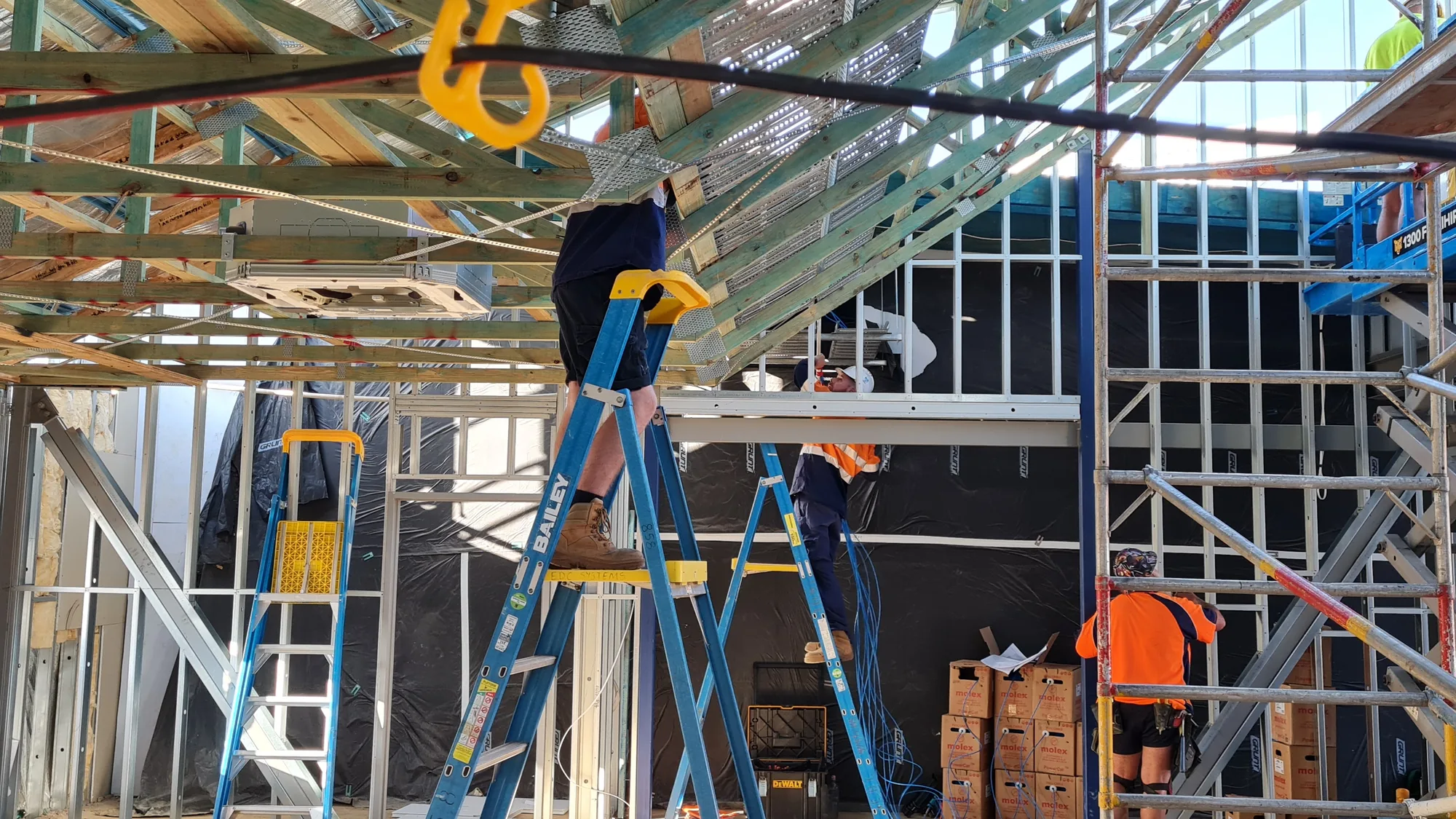 EDC Systems technicians installing data and communications cabling in a new facility